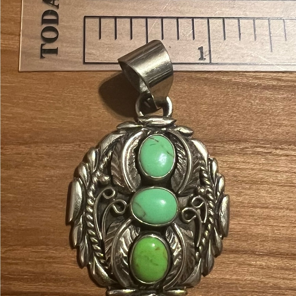 Silver Pendant with Green Stones
